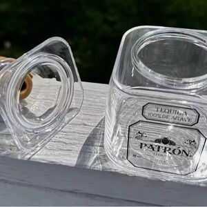 Empty reusable plastic bottle with straw